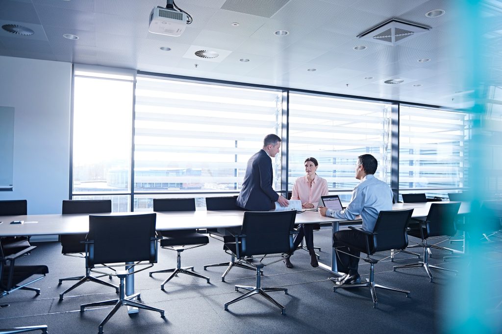Business team meeting at boardroom table